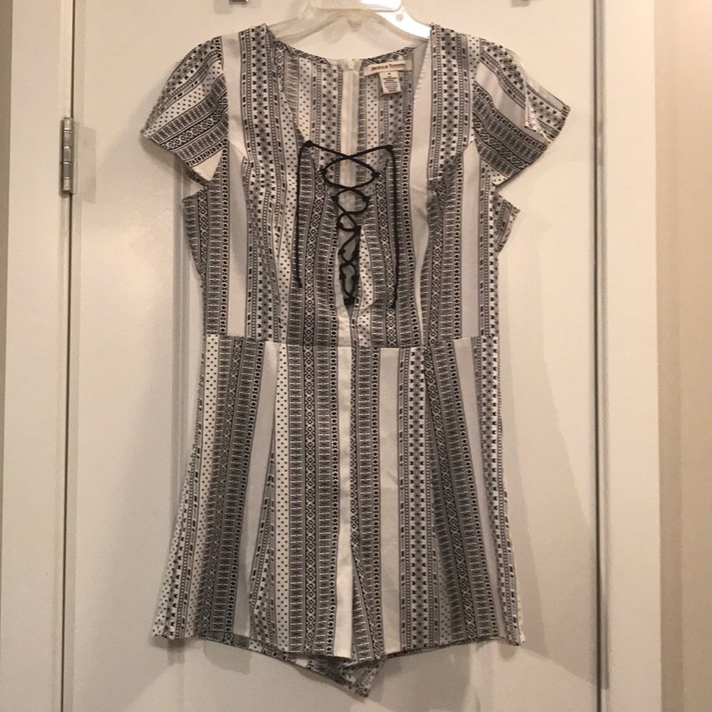 ❌SOLD❌ Jealous Tomato Lace Up Romper